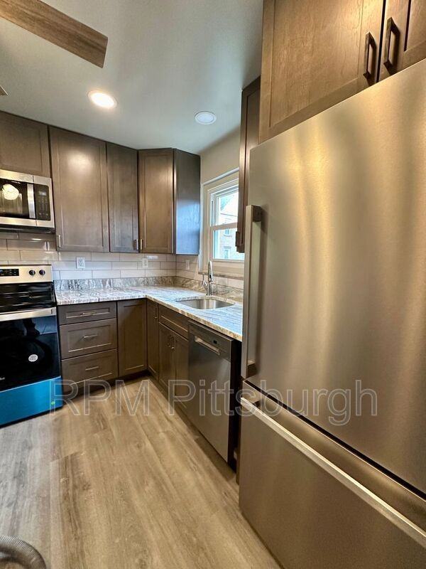 400 Ashton Ave - Photo 2 of 16