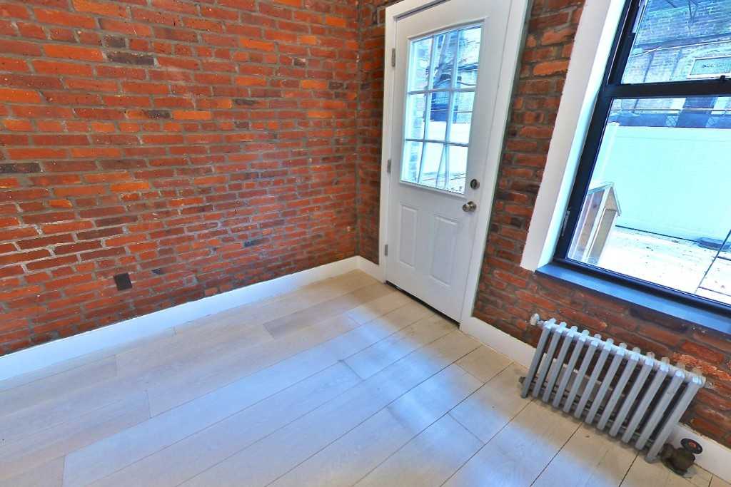 438 W 52nd St #1A - Photo 6 of 8