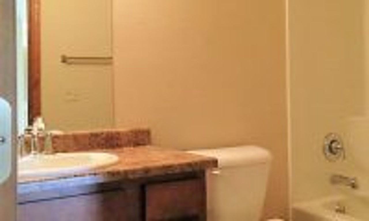 NO STAIRS TO THIS DUPLEX ON THE WEST END! - Photo 3 of 6