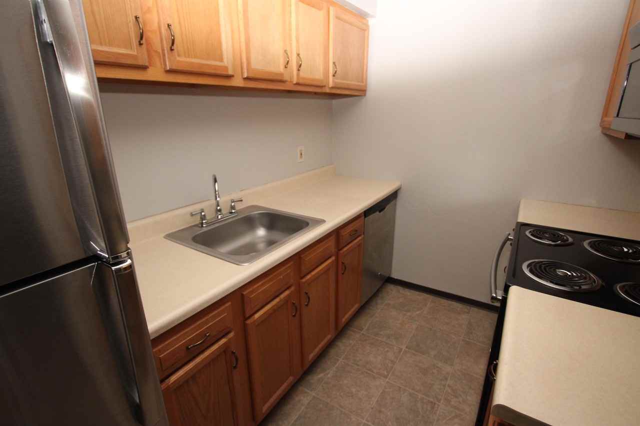 WELLINGTON SQUARE -- 304 - Photo 3 of 50