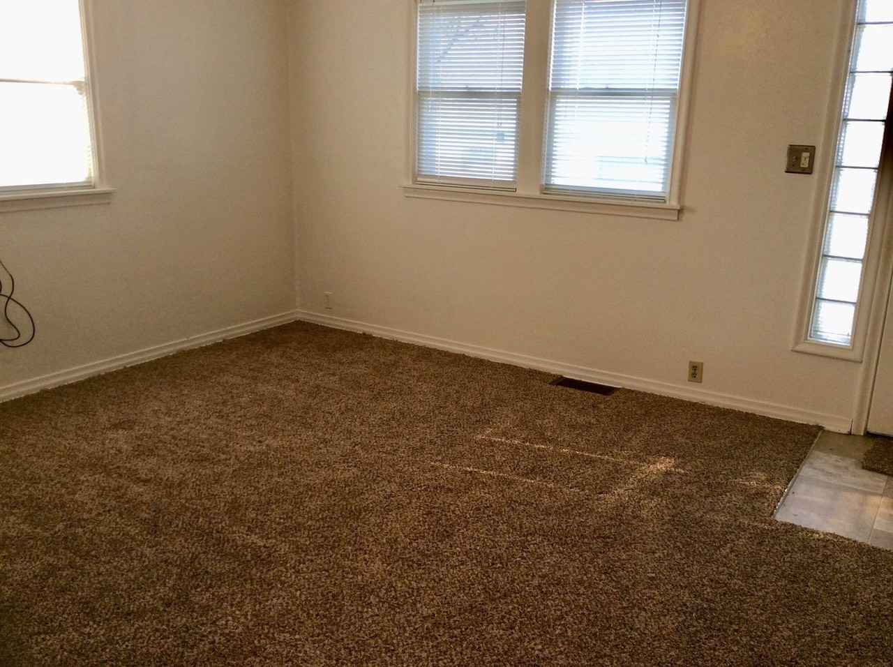 211 1/2 2nd Ave E - Photo 3 of 12