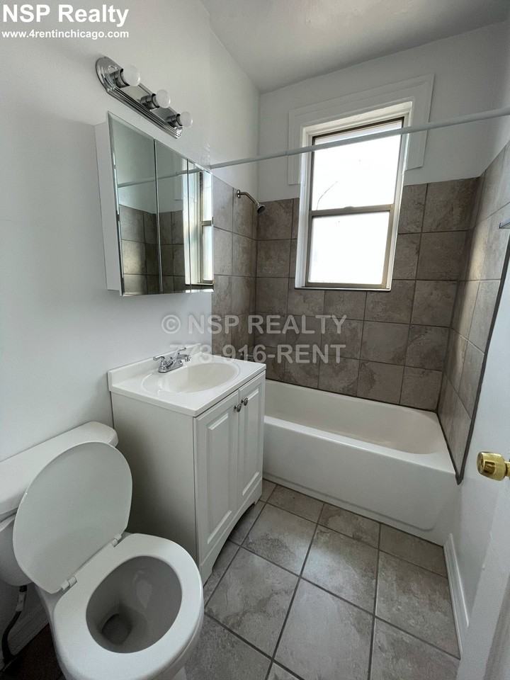 1373 W Estes Ave #1H - Photo 3 of 3