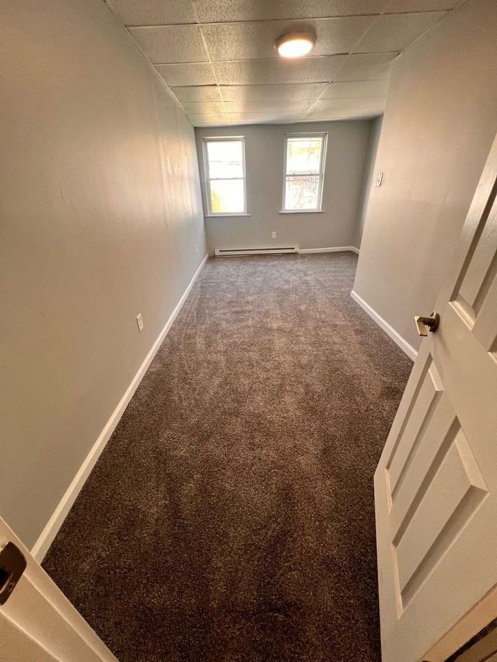 1125 Centre St - Photo 2 of 6