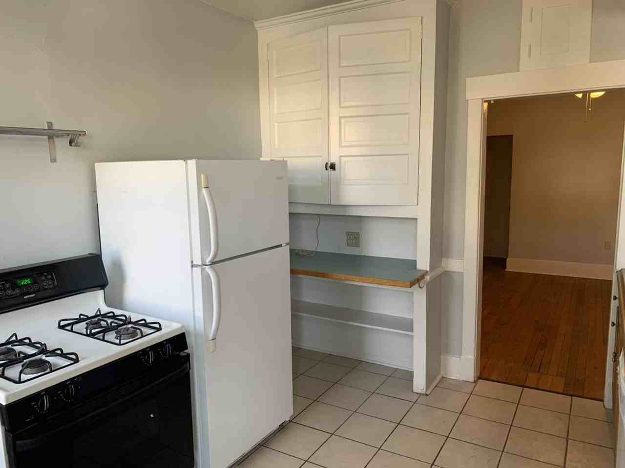 6915 Standish St - Photo 5 of 23