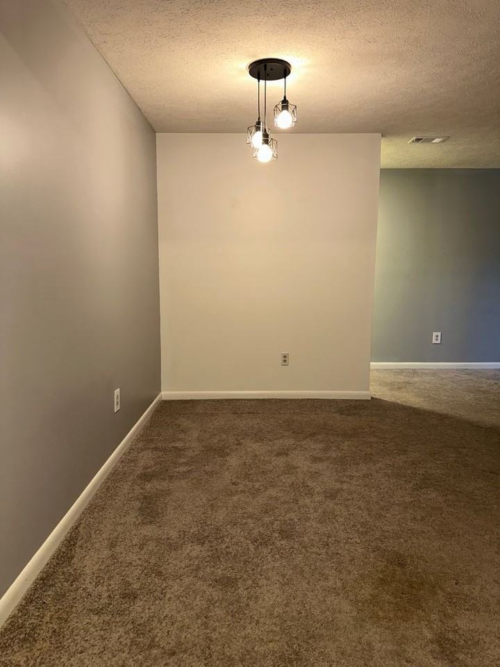 1002 Magnolia Woods Ct Unit G - Photo 3 of 13