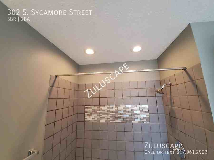 302 S Sycamore St - Photo 3 of 33