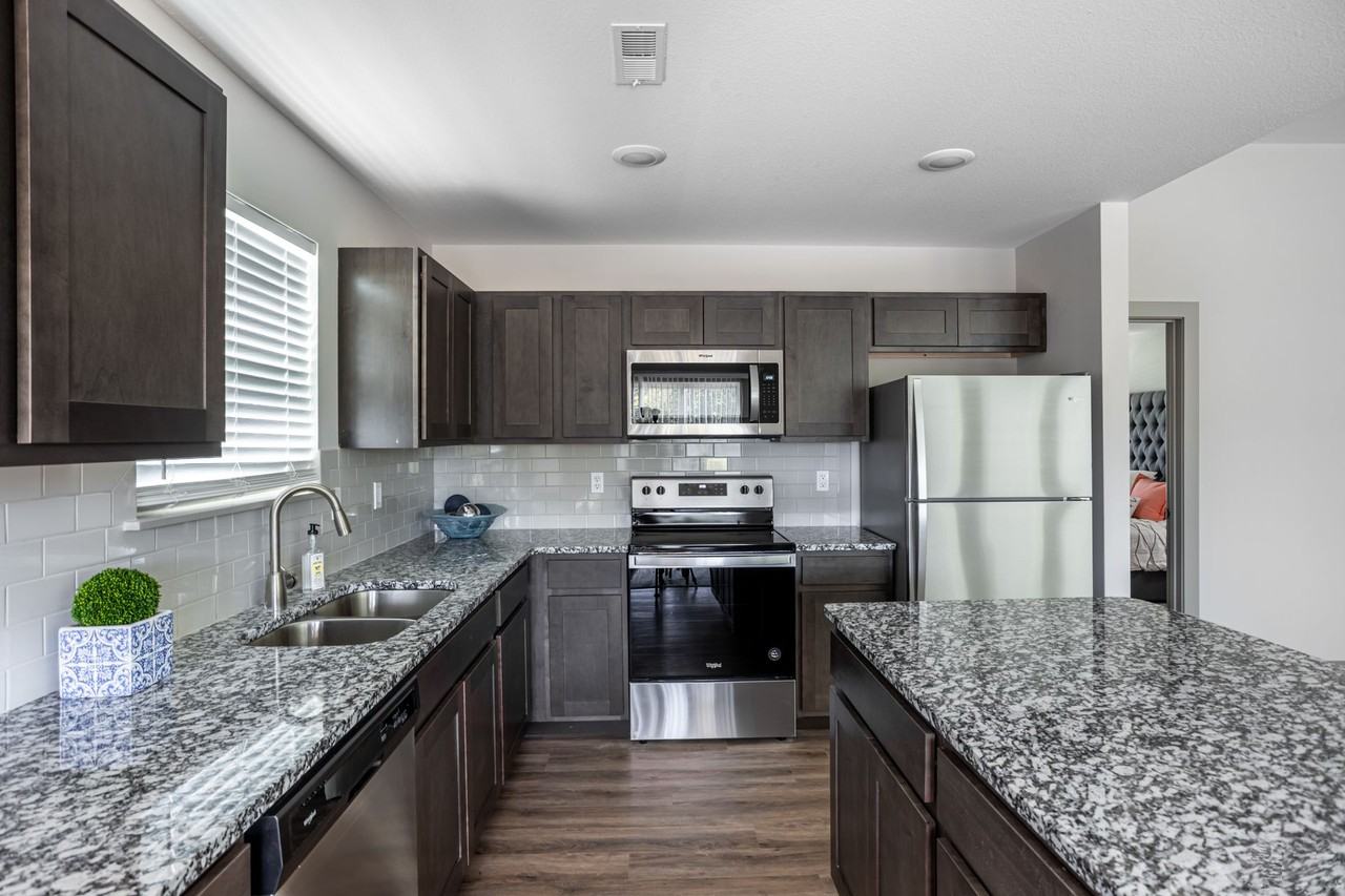 Manor Homes - Photo 4 of 26