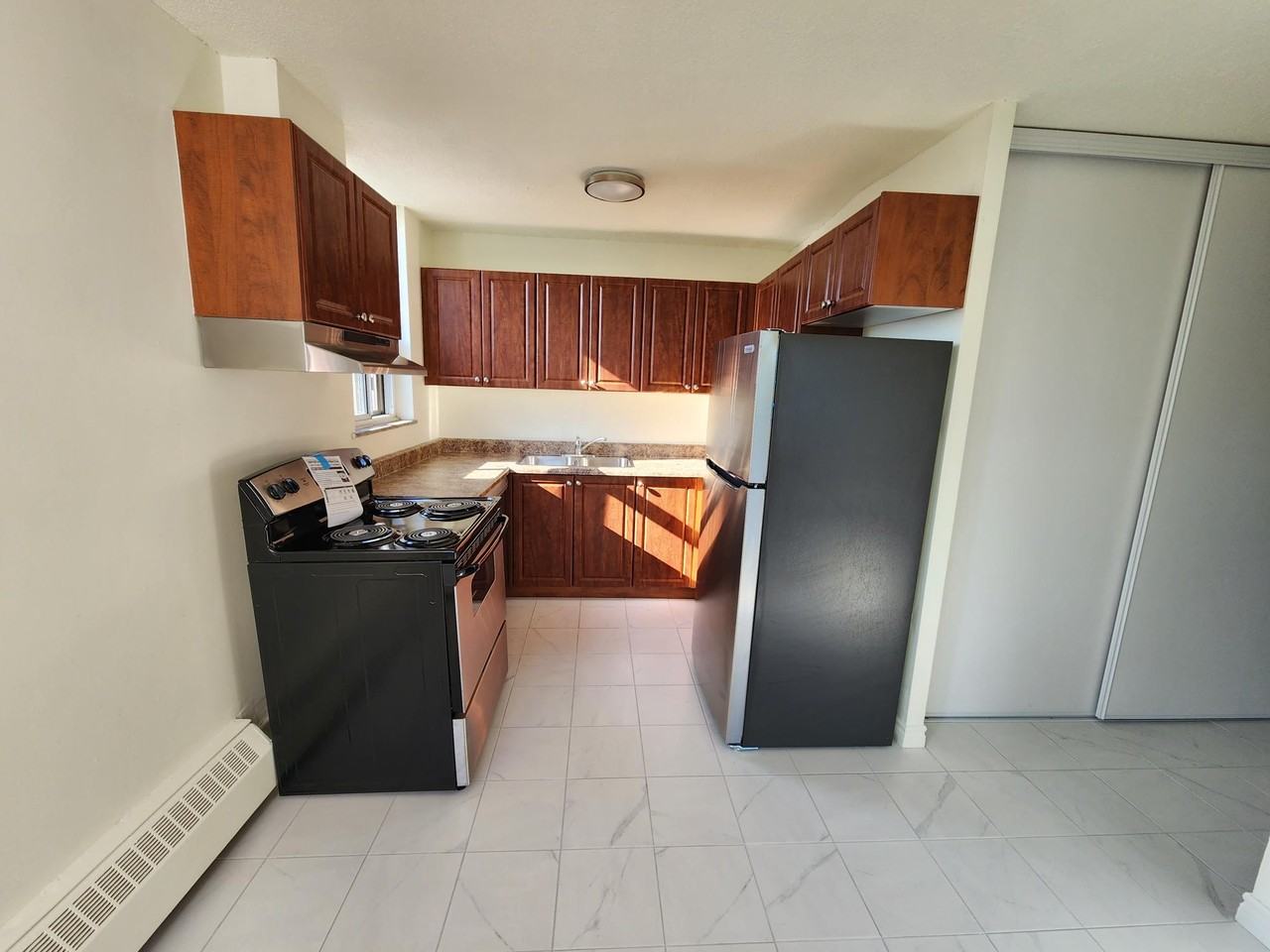 Kitchener Manor Apartments - Photo 3 of 12