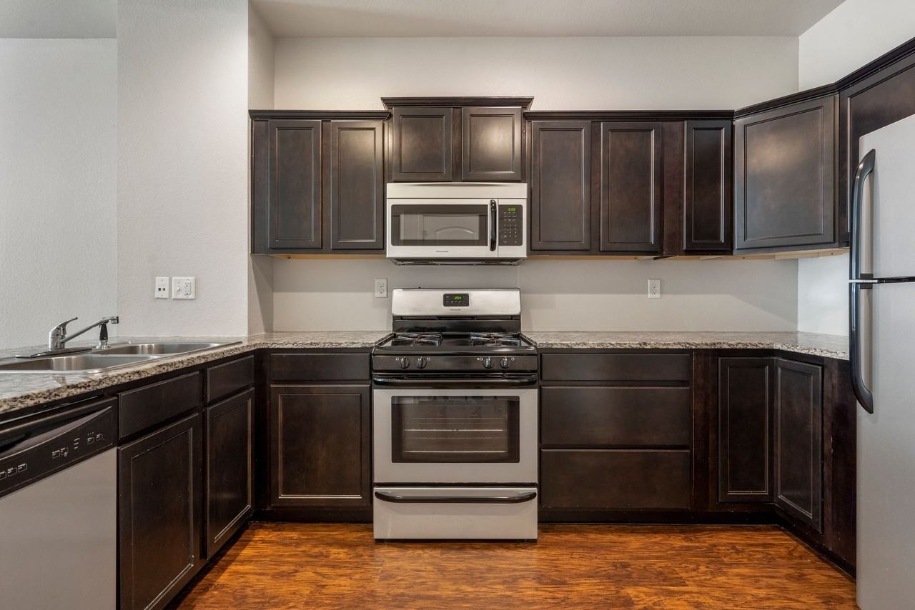 Pin Oak Townhomes - Photo 2 of 36