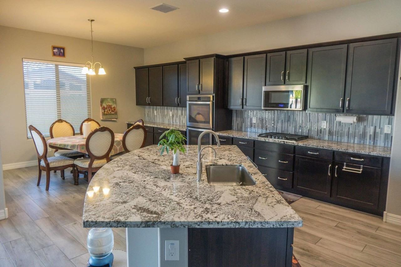 9775 W Rowel Rd - Photo 2 of 38