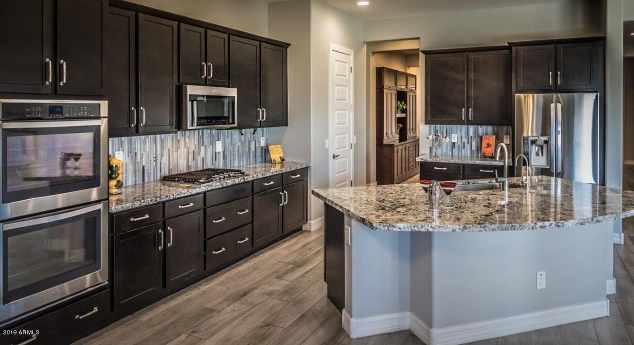 9775 W Rowel Rd - Photo 3 of 38