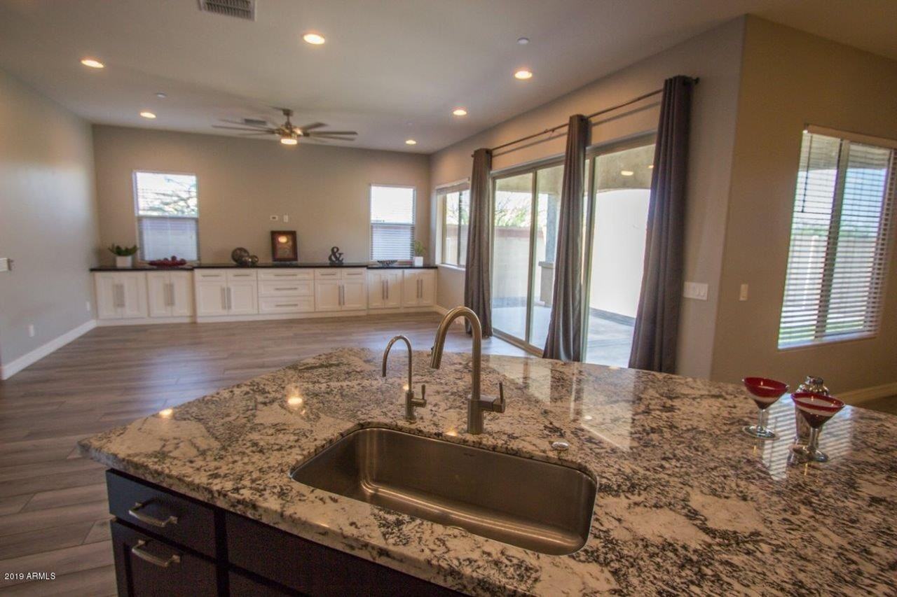 9775 W Rowel Rd - Photo 6 of 38