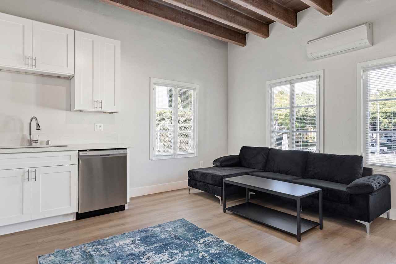 A 6 Bedroom, 6 Bathroom apartment with common areas and a fully functional kitchen at 1707 Kelton Ave. - Photo 2 of 50