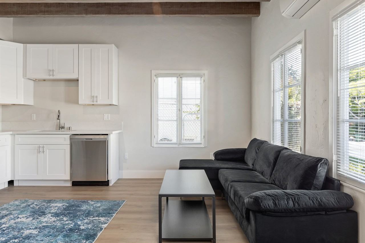 A 6 Bedroom, 6 Bathroom apartment with common areas and a fully functional kitchen at 1707 Kelton Ave. - Photo 3 of 50