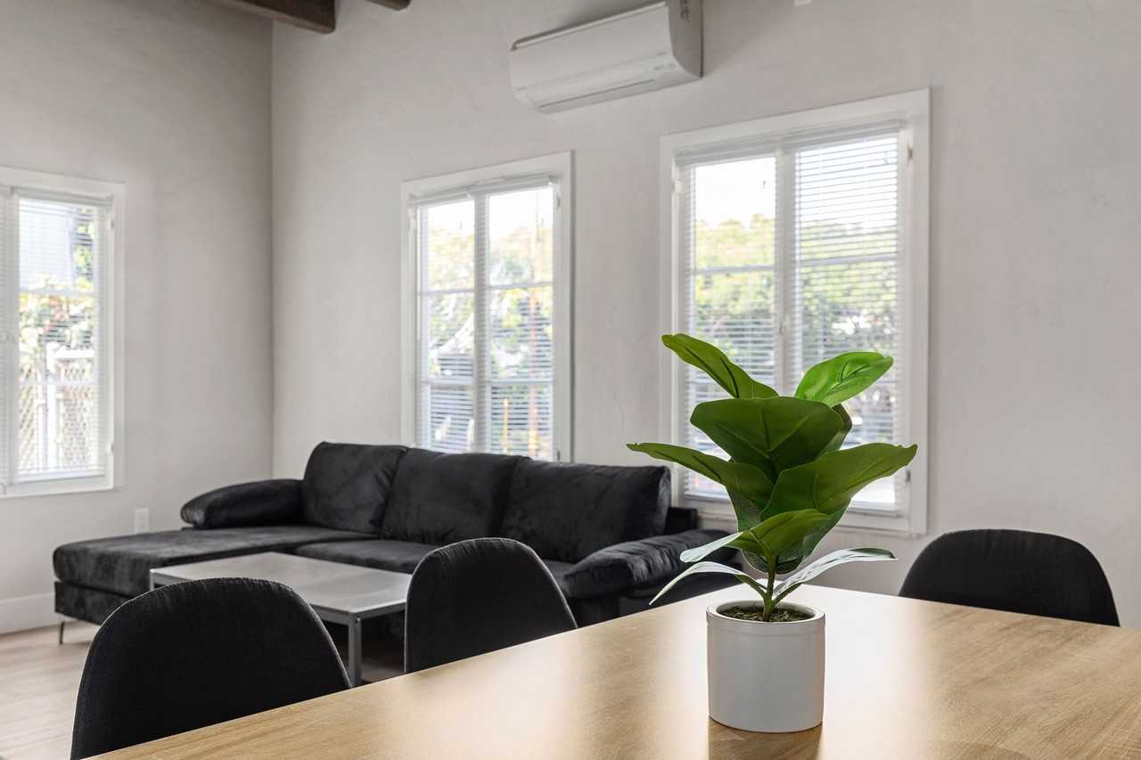 A 6 Bedroom, 6 Bathroom apartment with common areas and a fully functional kitchen at 1707 Kelton Ave. - Photo 6 of 50