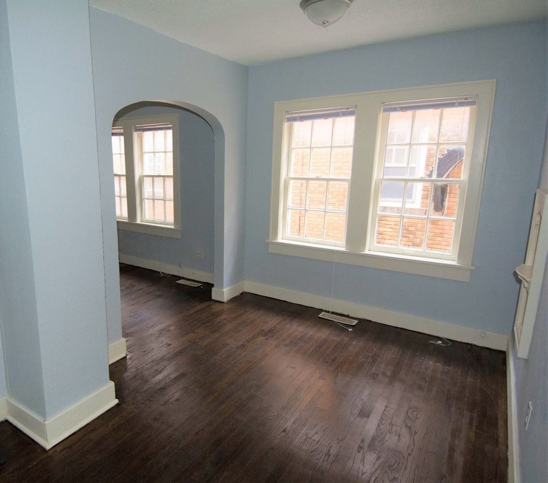 SUPER CUTE HISTORICAL PROPERTY! AFFORDABLE AND COZY - Photo 4 of 10