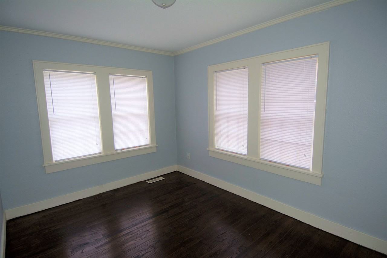 SUPER CUTE HISTORICAL PROPERTY! AFFORDABLE AND COZY - Photo 6 of 10