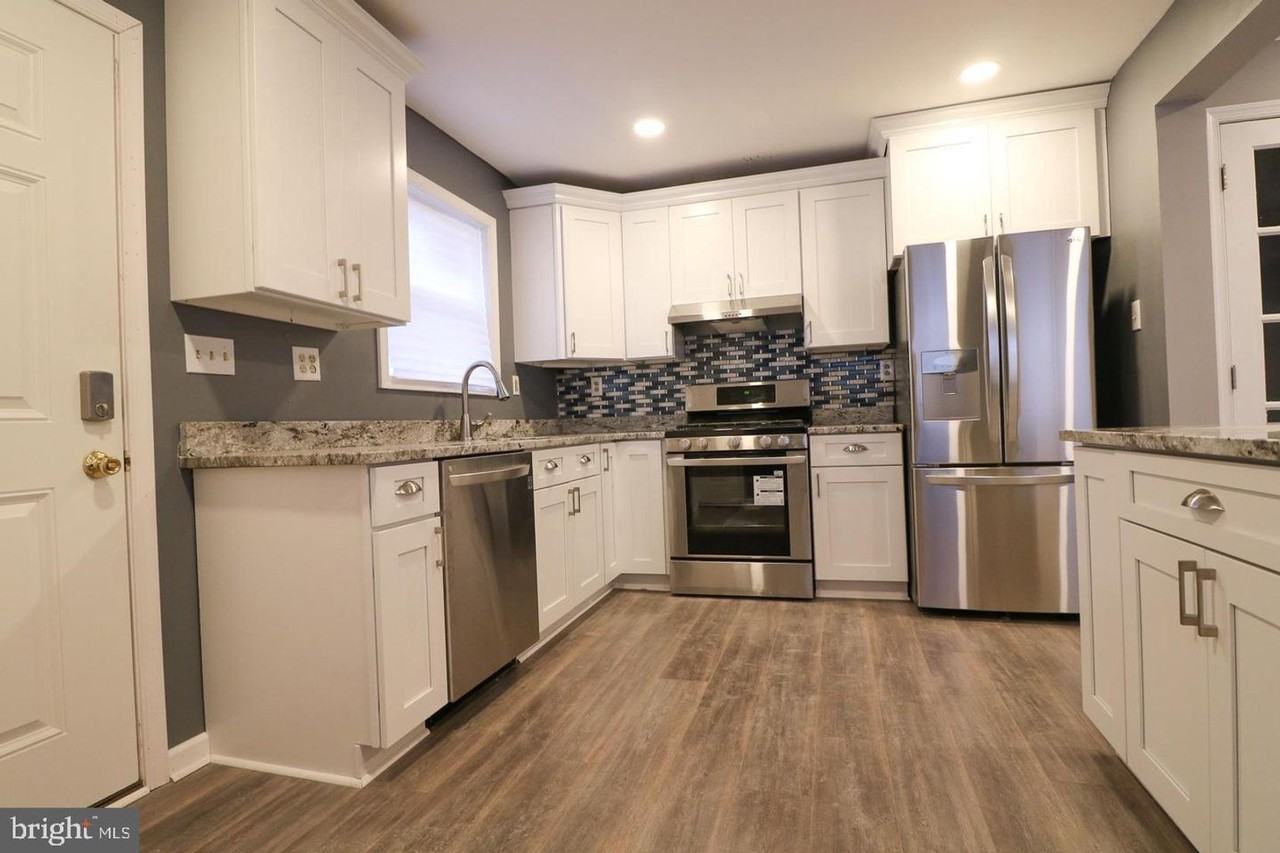 Beautiful updated 3 bed 3 bath with finished basement and THREE PARKING SPOTS - Photo 2 of 16
