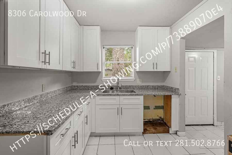 8306 Carolwood Dr - Photo 2 of 12