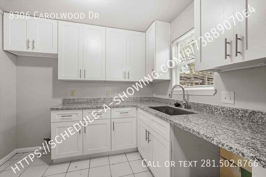 8306 Carolwood Dr - Photo 3 of 12