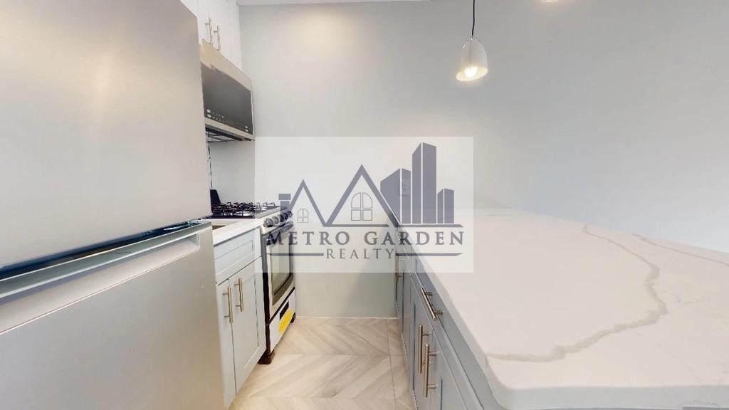 63-52 Saunders Street #2A - Photo 2 of 16