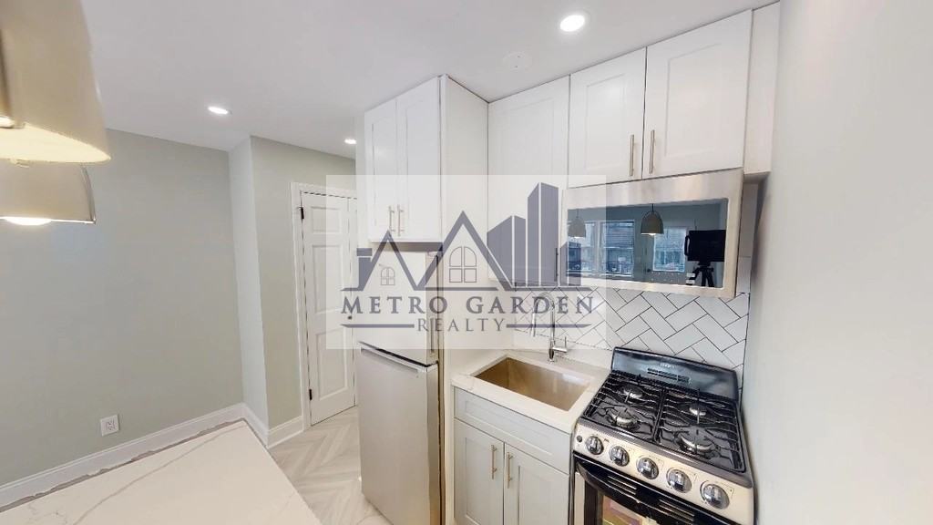 63-52 Saunders Street #2A - Photo 3 of 16