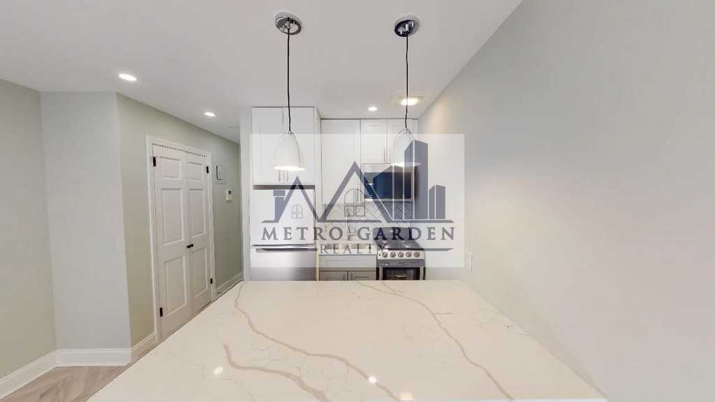 63-52 Saunders Street #2A - Photo 5 of 16