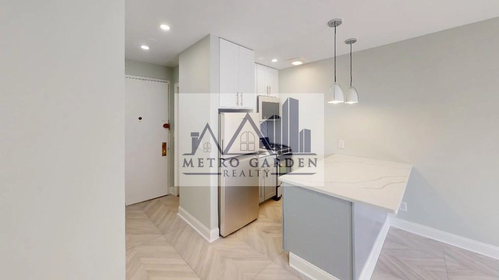 63-52 Saunders Street #2A - Photo 6 of 16