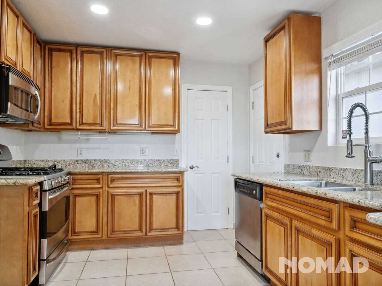 6636 Outlook Ave - Photo 3 of 30