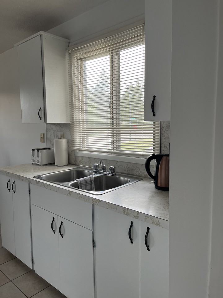 5844 Dalgleish Road Northwest #Main - Photo 3 of 11