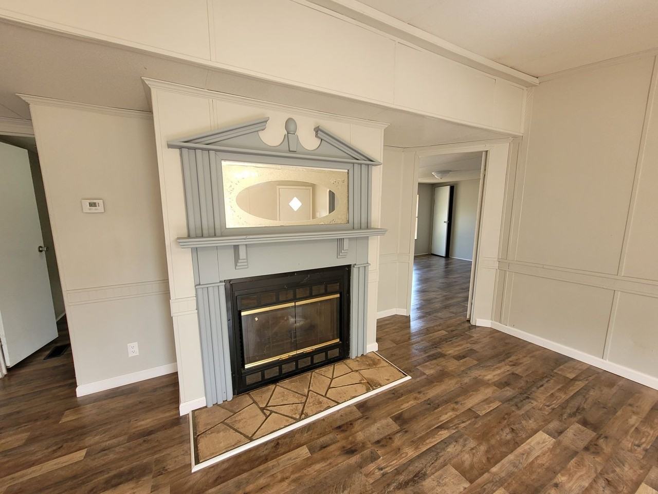 Whispering Pines - Photo 2 of 2