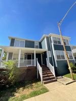 featured image of 318 E 10th St