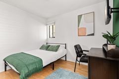 A fully furnished 4 bedroom, 2 bathroom apartment with common areas at 1823 Pelham Ave. Unit 1 - Photo 1 of 1