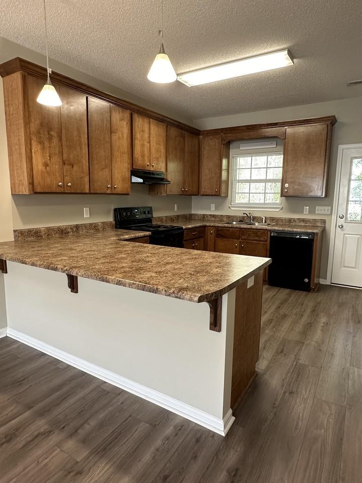 Creekside Villas - Photo 4 of 14