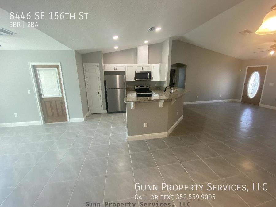 8446 Se 156th St - Photo 4 of 16