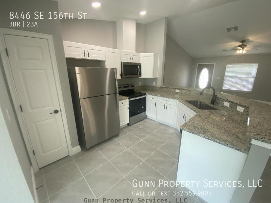 8446 Se 156th St - Photo 5 of 16