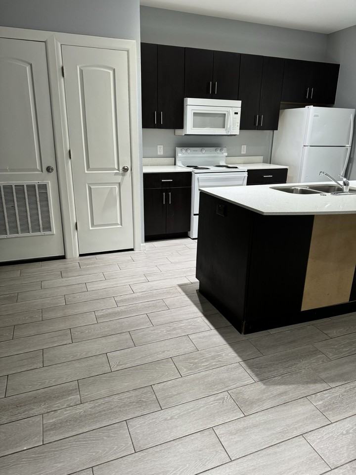 University Apartments - Photo 2 of 19