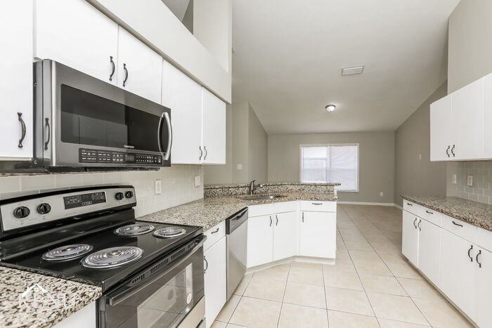 14428 Peppermill Trl - Photo 2 of 17