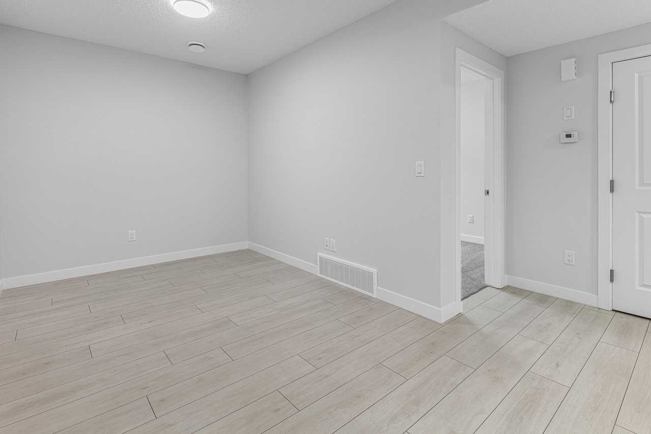 1439 Cherniak Way Sw Bsmt #BS - Photo 6 of 17