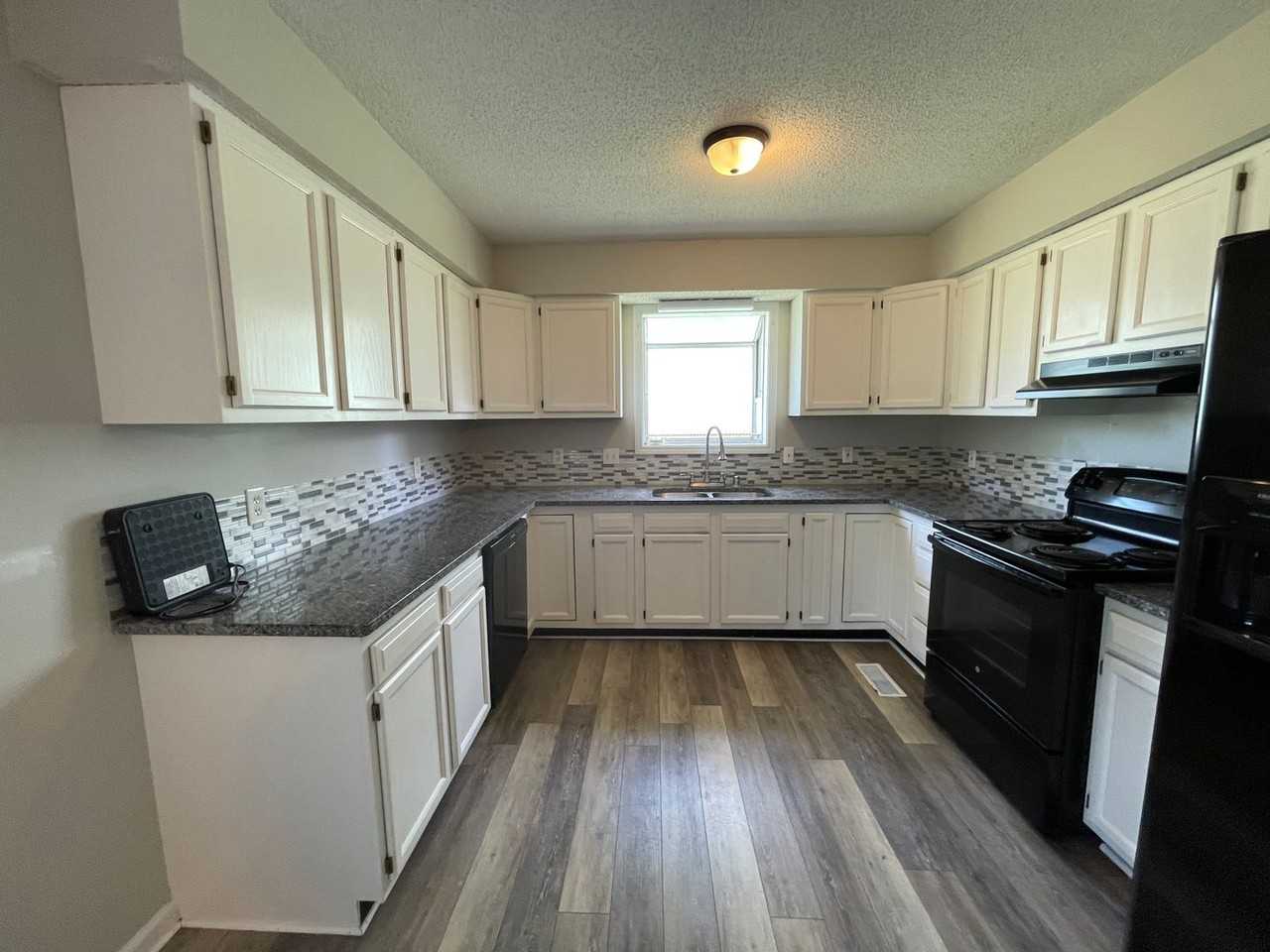 425/427 E 2nd Ave - Photo 3 of 16