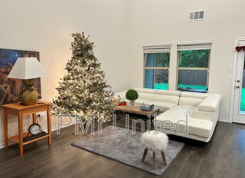 2117 Rustling Oaks Dr - Photo 3 of 14