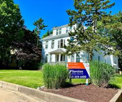 featured image of 201 S Elm St