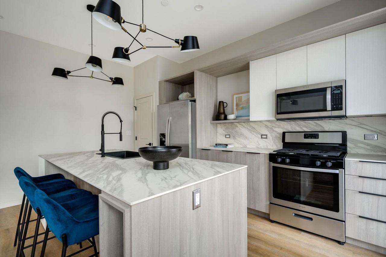 THE OLSON APARTMENTS - Photo 3 of 50