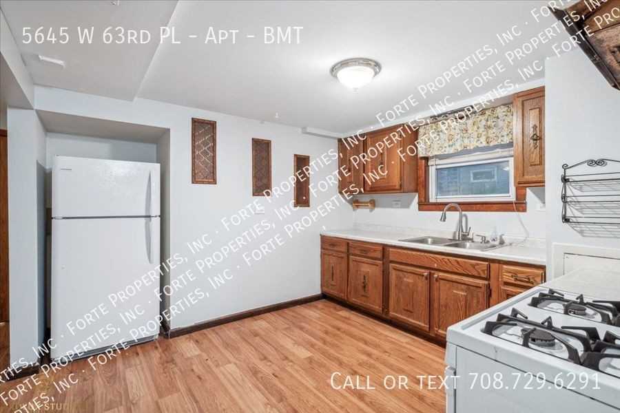 5645 W 63rd Pl #BMT - Photo 3 of 13