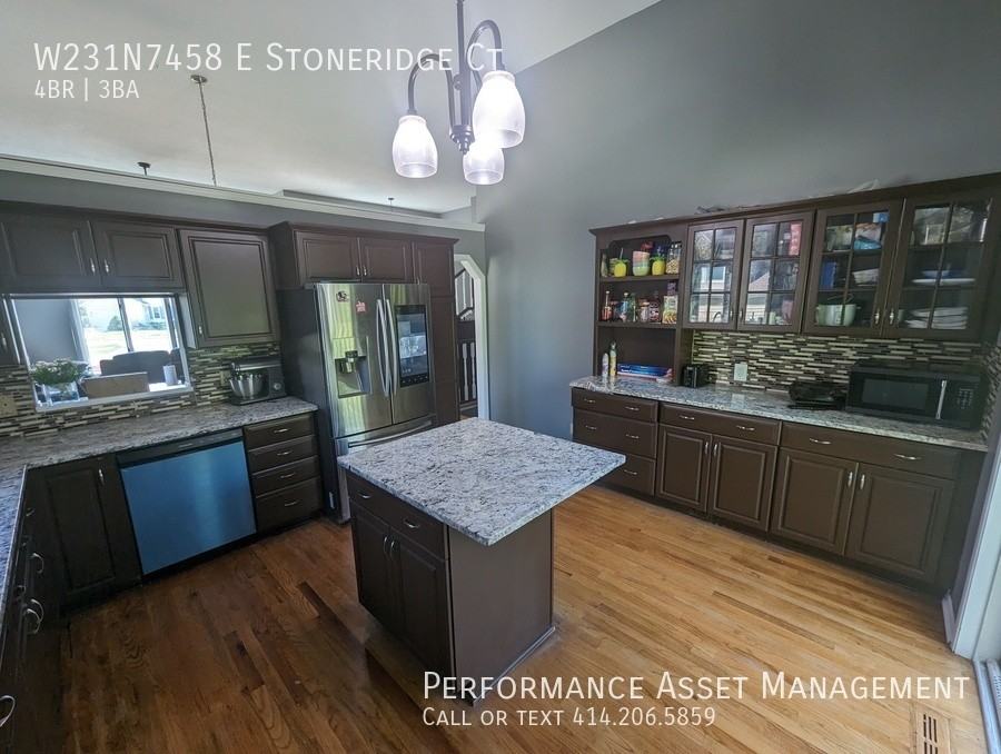 W231N7458 E Stoneridge Ct - Photo 3 of 13