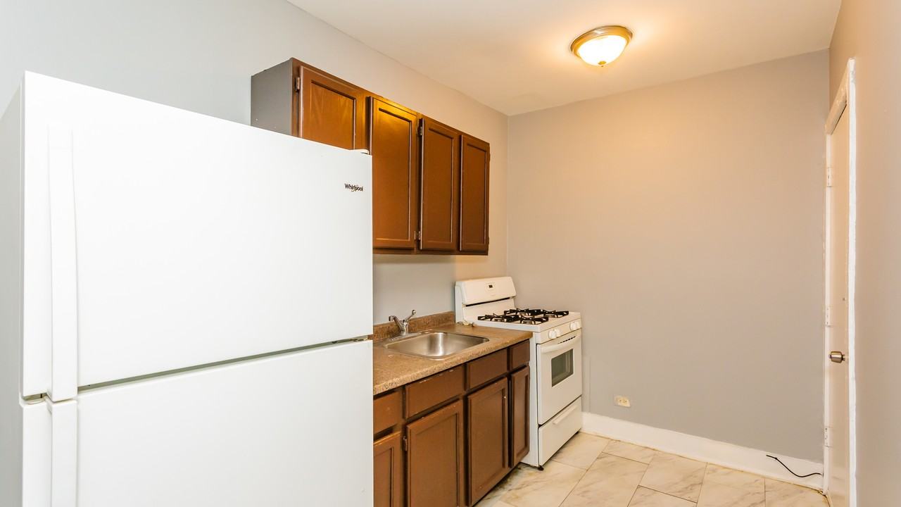 6949-59 S Paxton Ave / 2206 E 70th St - Photo 3 of 31