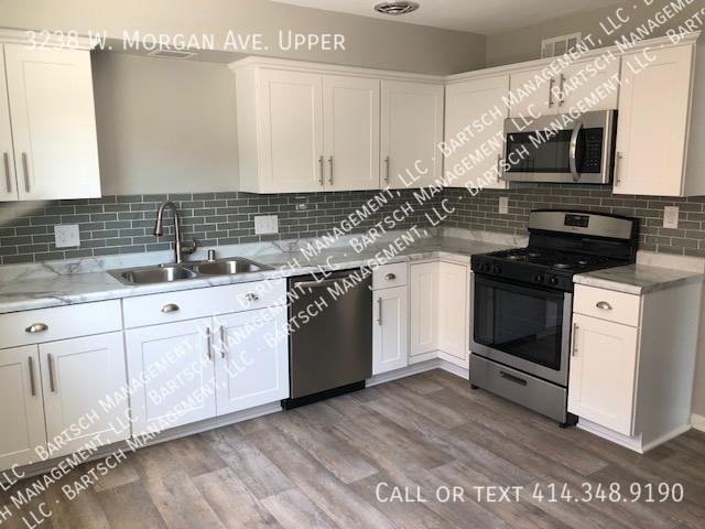 3238 W Morgan Ave Uppr - Photo 2 of 4