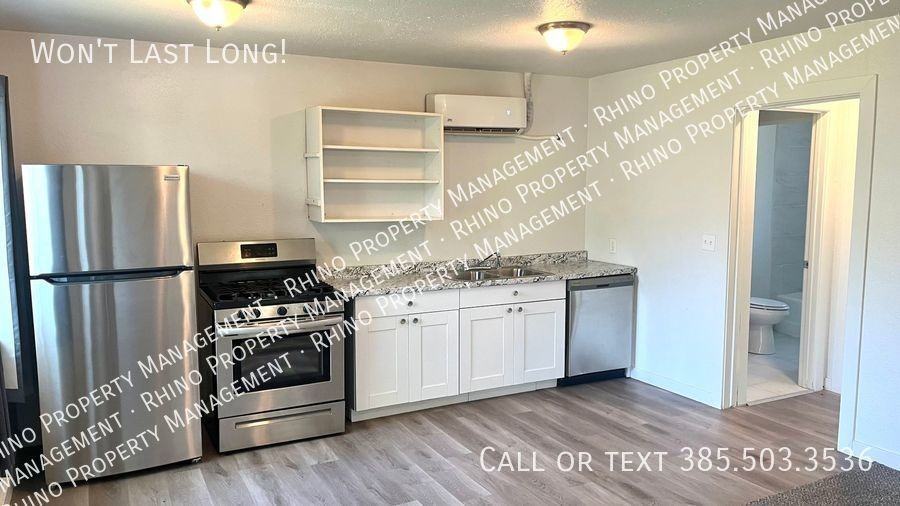 666 28th St - Photo 2 of 6