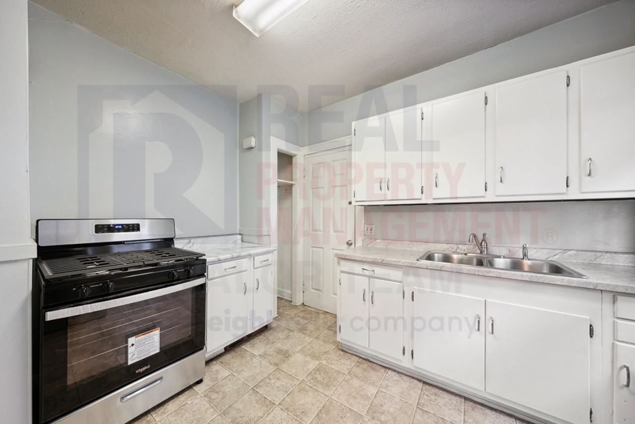 7407-7409 Brookpark Rd, - Photo 3 of 8