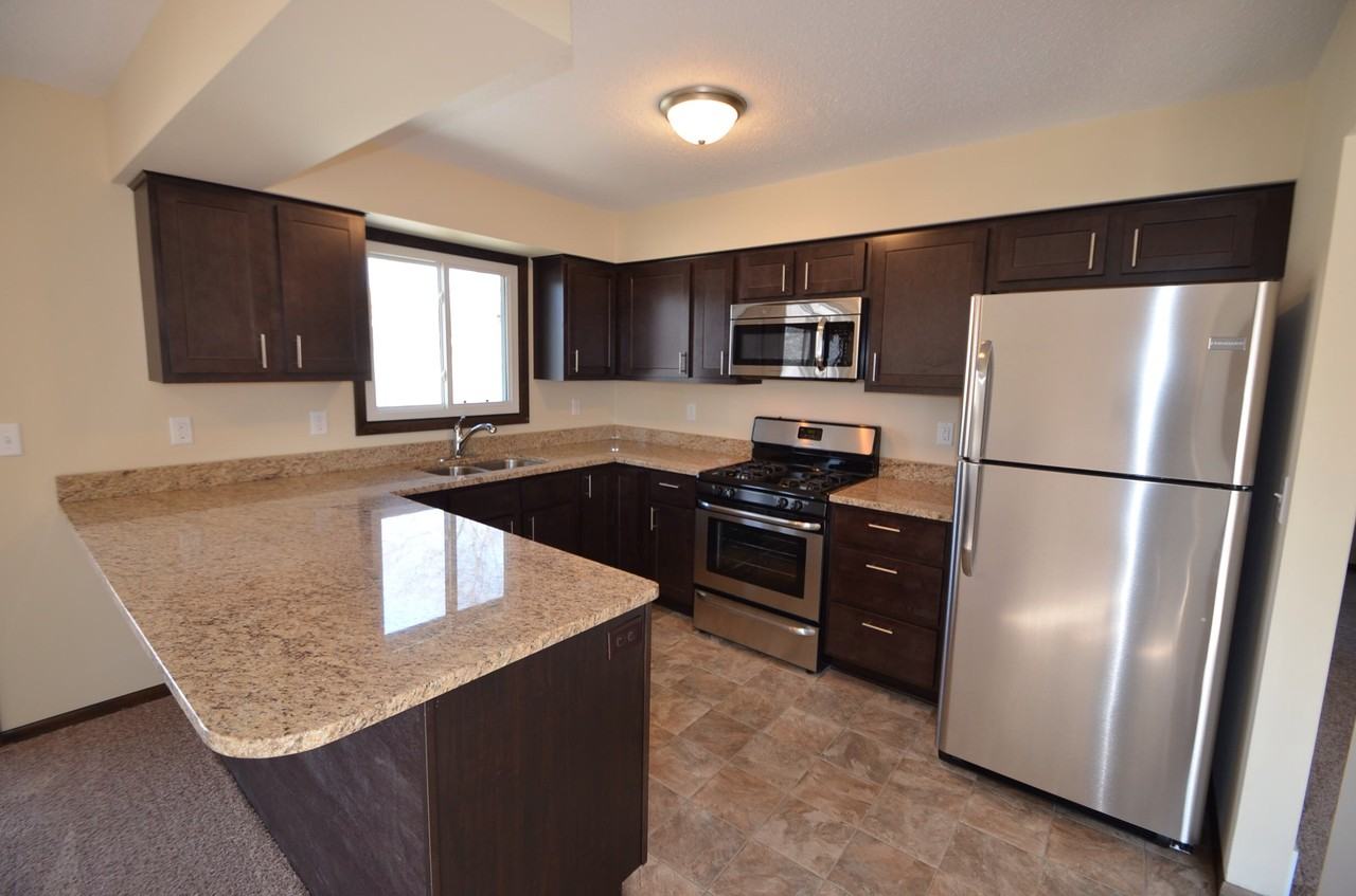 12950 Arrowood Ln N - Photo 3 of 11